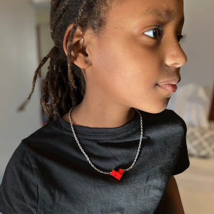 child wearing Red valentine heart necklaces made from Lego® pieces