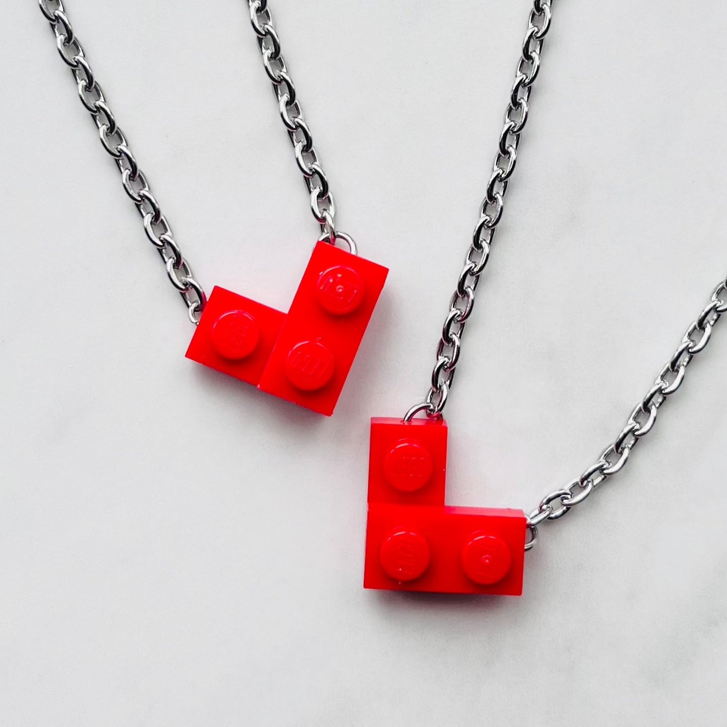 two Red valentine heart necklaces made from Lego® pieces to match with a friend Valentine